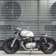 demo-attachment-17-motorcycle-standing-in-dark-building-in-rays-of-P6PVJNM-e1559381296852